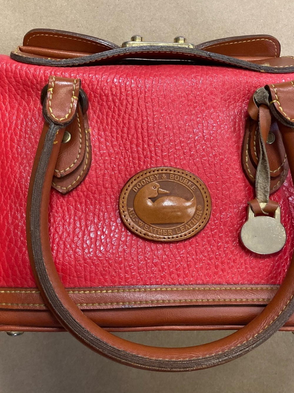 Dooney & Bourke Red Pebbled Leather Satchel Brown Trim Top Handle Bag
